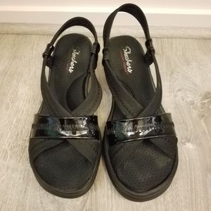 Black Sketchers memory foam wedge sandals